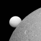 Illustration for article titled Enceladus and Dione Make a Glorious Pair In the Latest Cassini Image